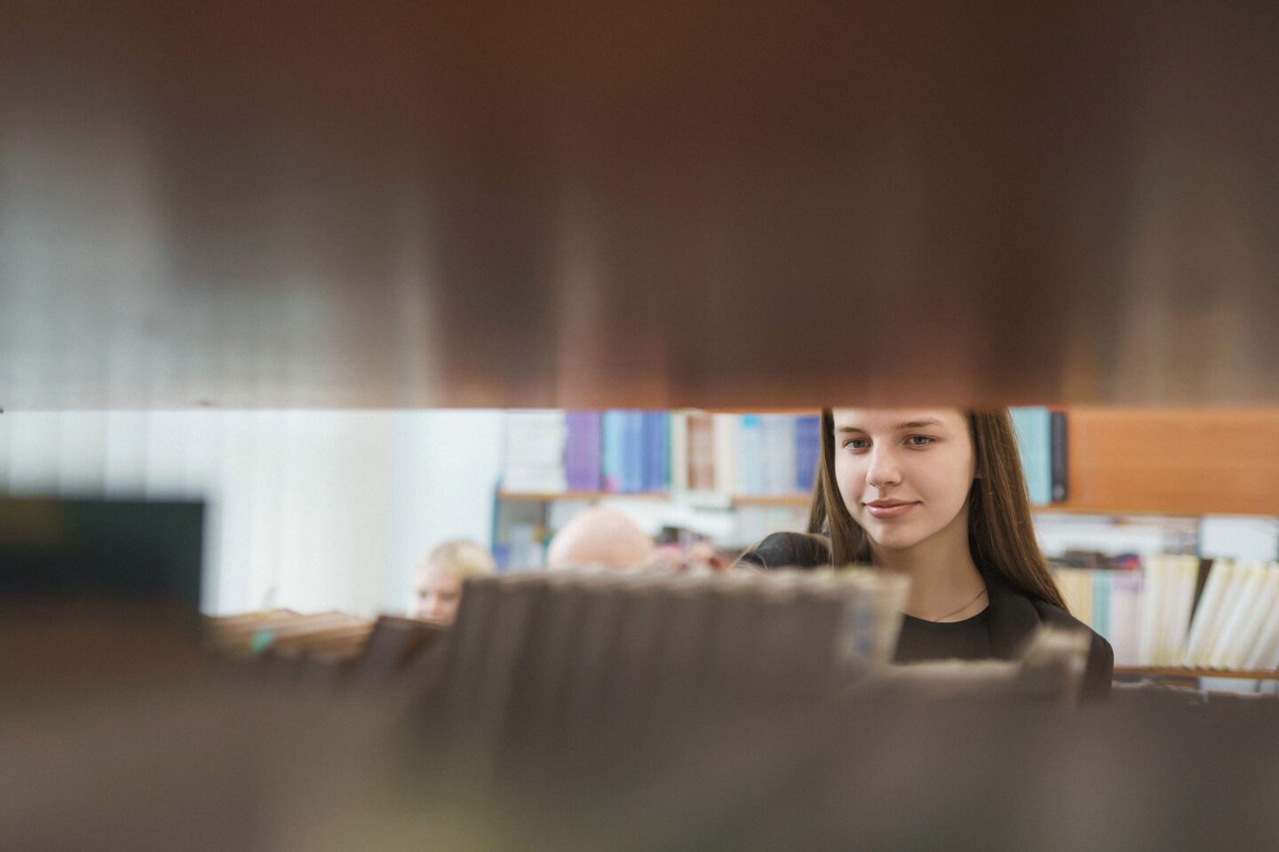 Studentai bibliotekoje